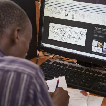 Researcher working at a computer.