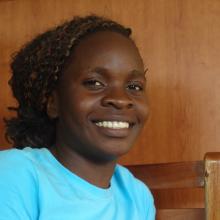  Babirye Gorretti, the young woman who opened her own computer school after business and computer skills training at Kawempe Youth Centre.